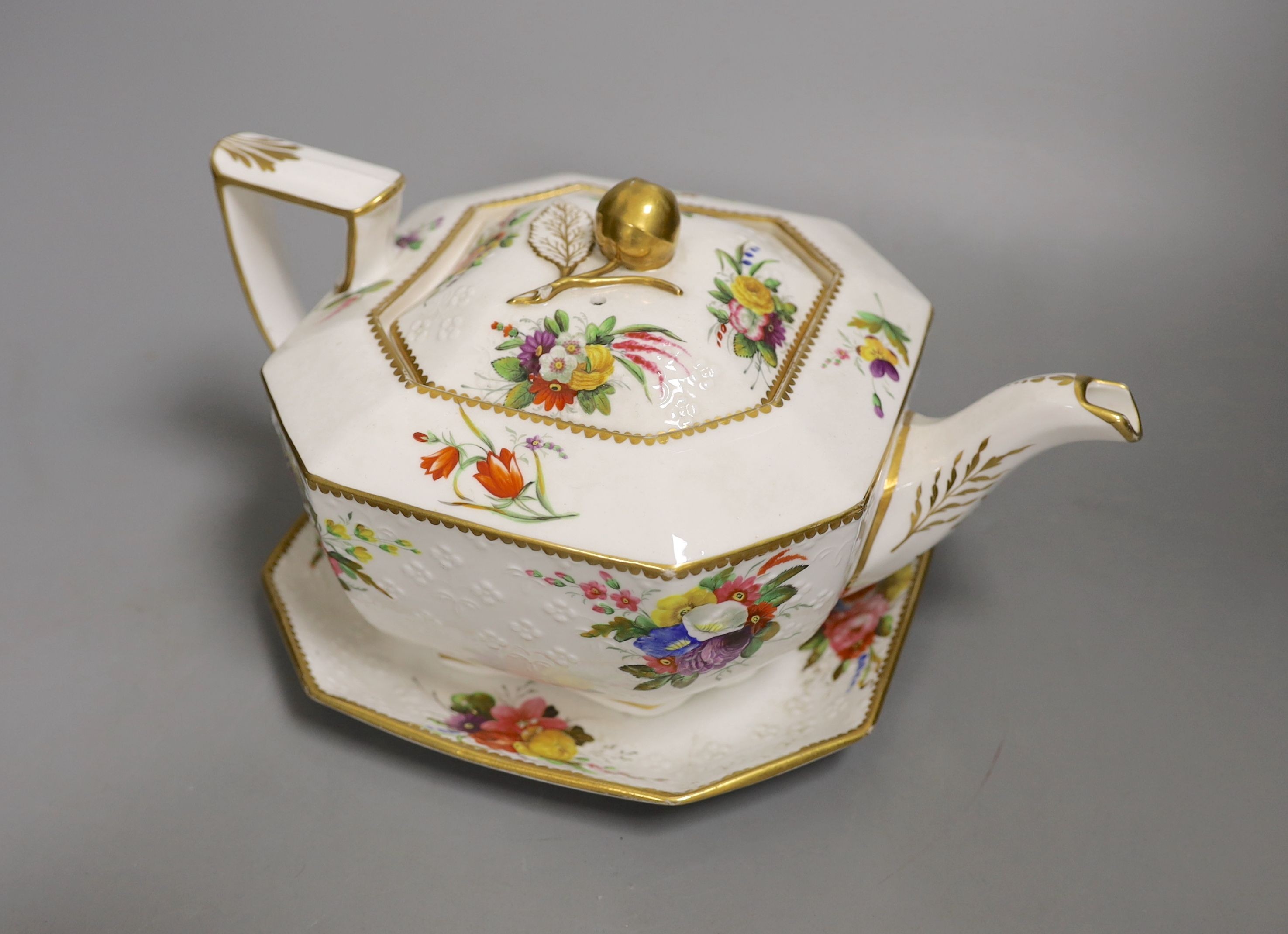 A Spode teapot cover and stand painted with flowers on a moulded body pattern 2527, c.1820, 24cm long